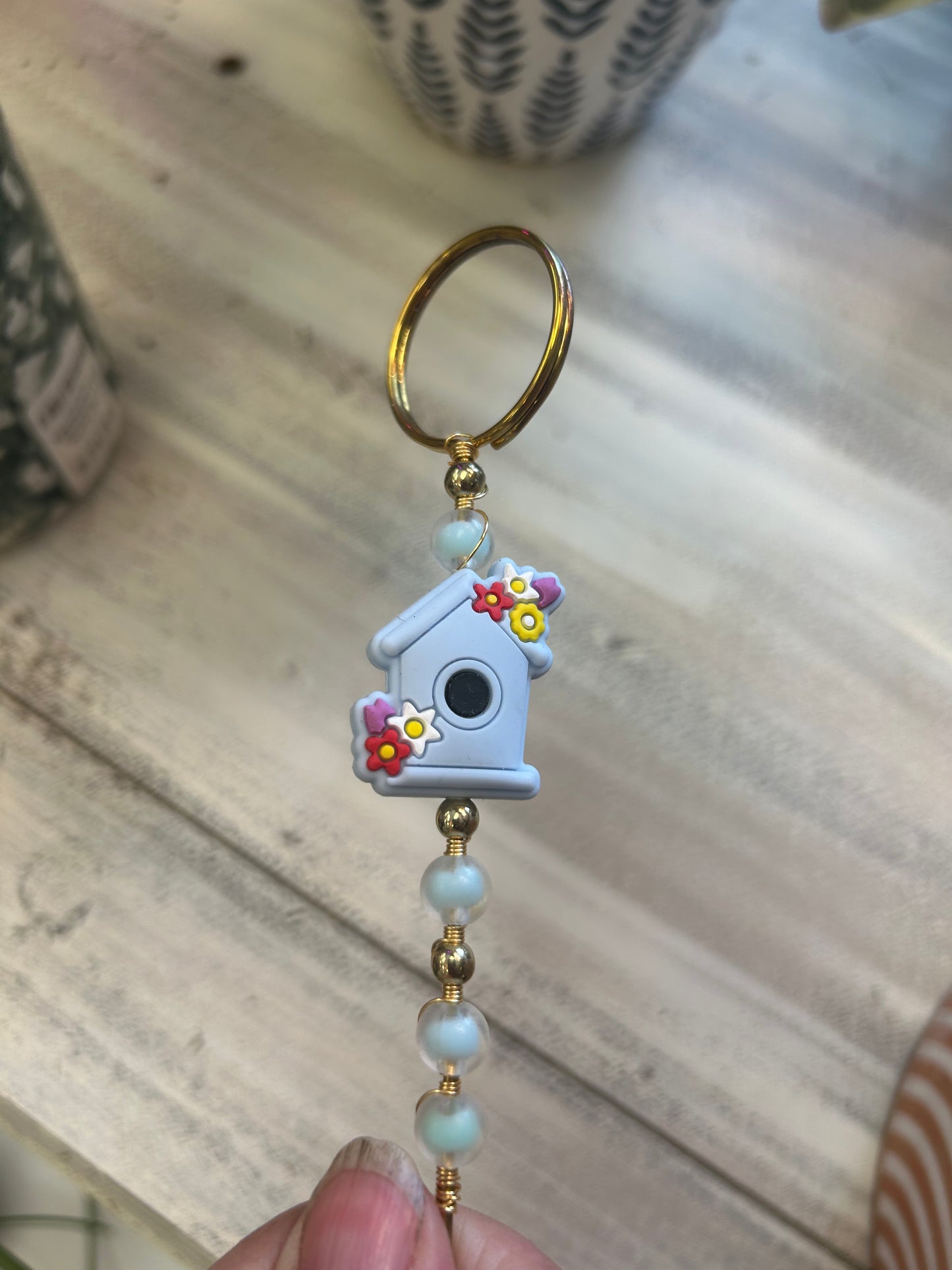 Birdhouse plant jewelry