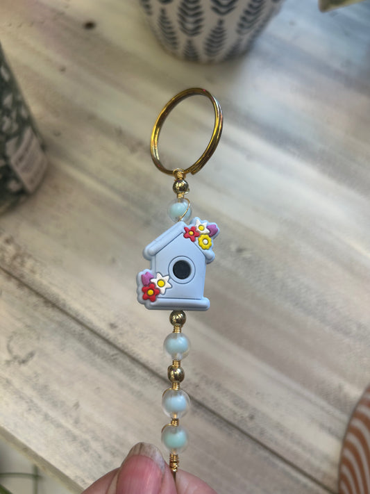 Birdhouse plant jewelry